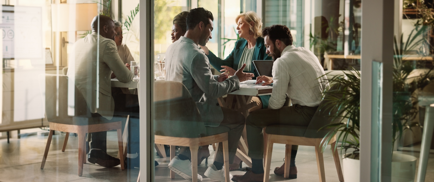 Corporate, people and talking at meeting in office for finance project, teamwork and accountant. Staff, communication and advice for proposal planning, information and feedback solution of investment