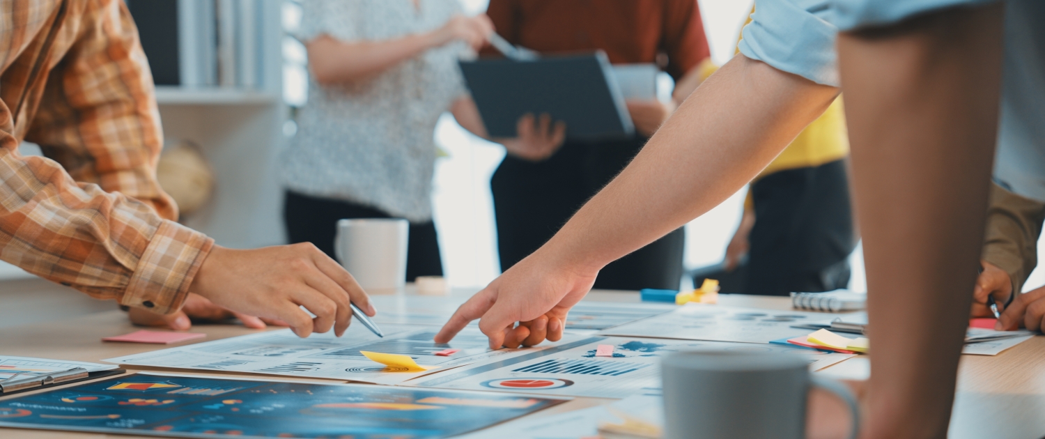 Collaborative Team Meeting with Focus on Strategy Development and Creative Planning in Bright Modern Office Environment SACTR
