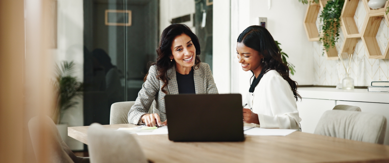 Meeting, women and business people with laptop in office, investment project and discussion. Teamwork, accountant and financial advisor with feedback for finance update, report review and documents